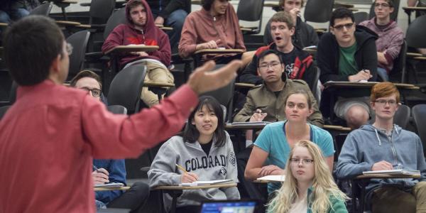 students listen to Professor Eric Cornell's lecture